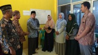 ASN Kemenag Aceh Besar Salurkan Zakat